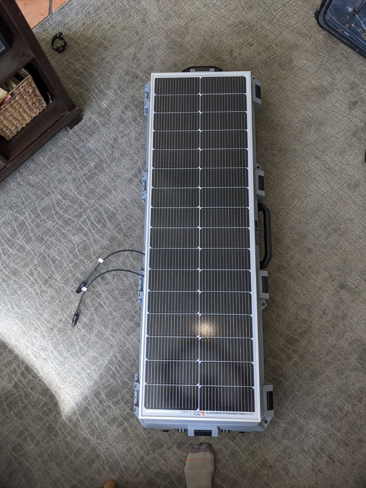 Solar panel mounted on Pelican V800 lid — top down view